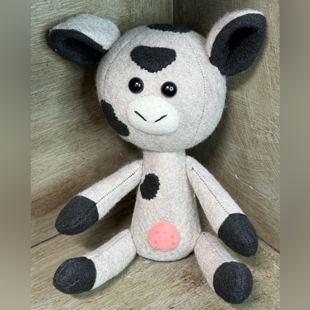 🐄 Black & White Plush Cow with Wildflower Embroidery